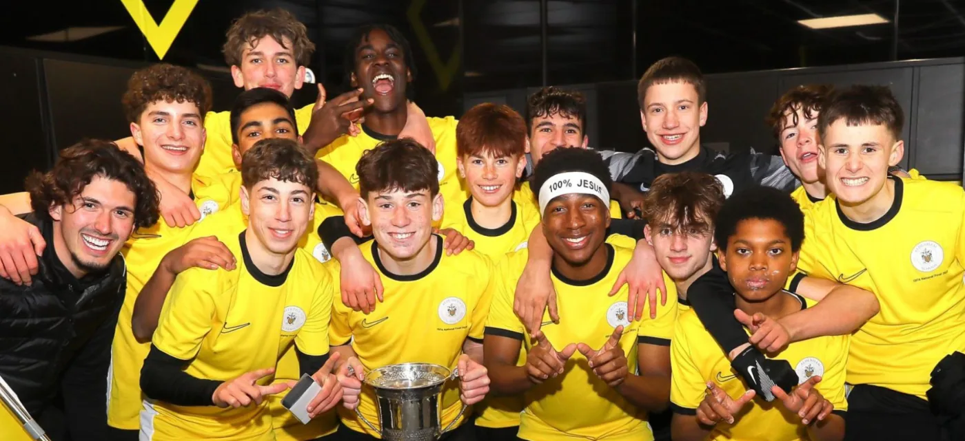 Aldenham squad celebrating together after a match