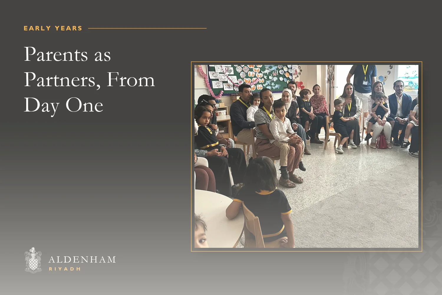 Parents sitting with their Nursery children in an Aldenham School Riyadh classroom decorated with ocean artwork