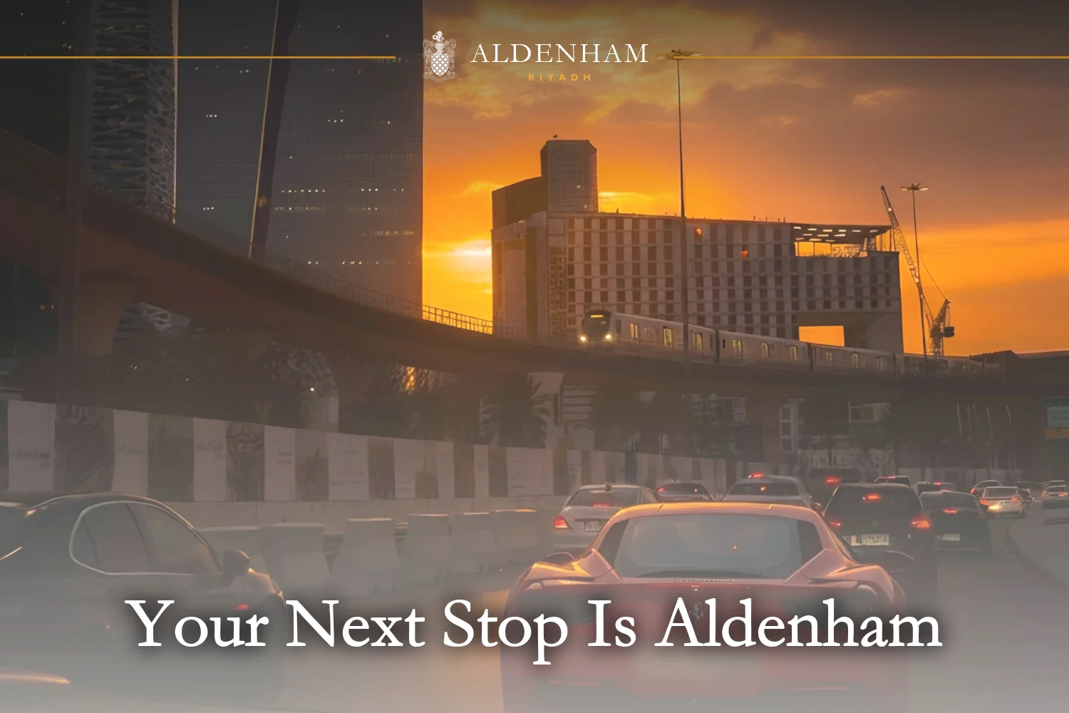 Evening traffic queuing on a Riyadh road at sunset, beneath an elevated metro line, with the city's towers behind